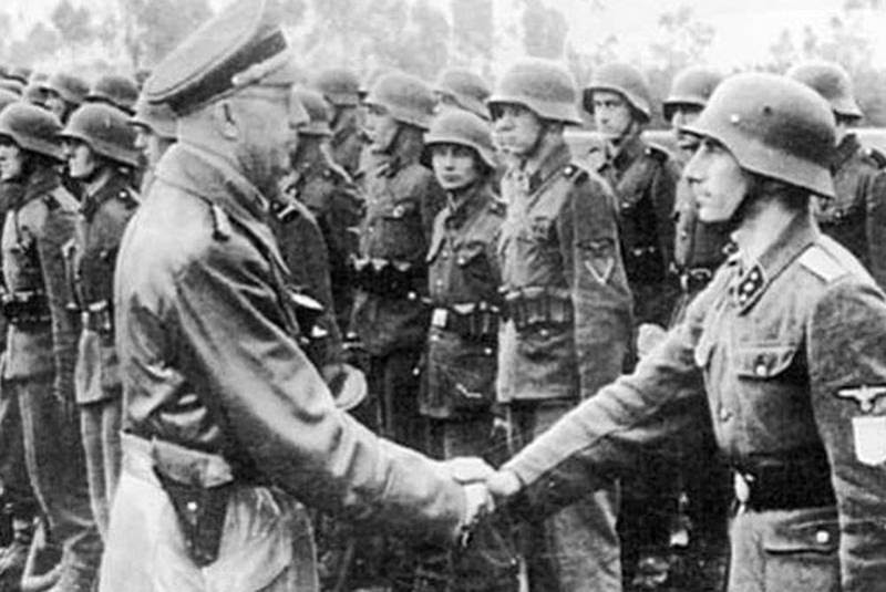  SS leader Heinrich Himmler greets members of the 14th SS Division during the Second World War. Police say graffiti left on an Oakville monument to the SS division is being investigated as a hate-motivated crime. (Photo courtesy US Holocaust Memorial Museum)